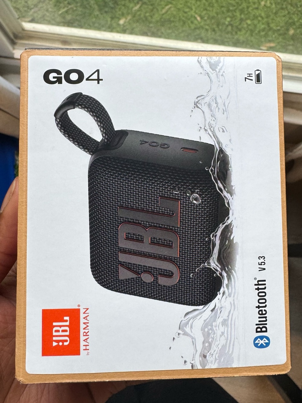 JBL GO 4 Portable Bluetooth Speaker - Black with Subtle Red Accents